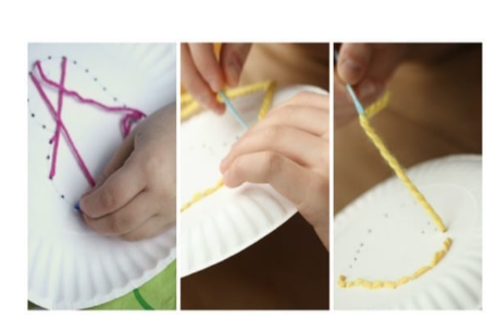 Paper plates being laced with a heart design