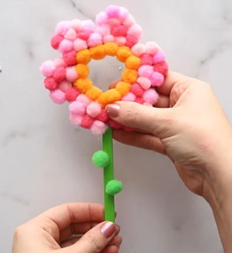 This is the craft that will go with story and art for the session. It is a flower pom pom magnet
