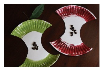 Paper plates decorated to look like apple cores