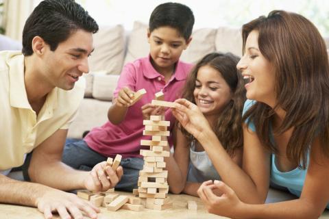 Family playing board games