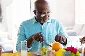 Senior man eating healthy foods