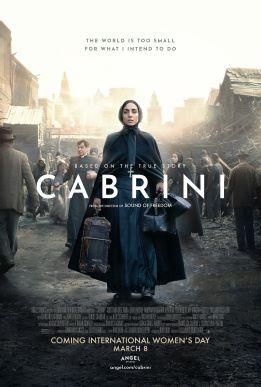 A historical drama movie poster for Cabrini shows a woman dressed as a nun walking forward through a crowded, dusty street lined with old buildings. She wears a long dark habit and carries a suitcase, looking determined as people move around her. The setting suggests an early 20th-century city. Text across the image reads “Cabrini,” with smaller text above and below referencing the true story and a release date of March 8, International Women’s Day.