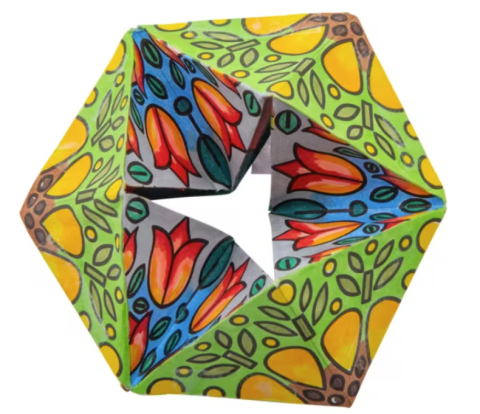 This picture is of four colorful kaleidocycles, which are a type of geometric paper craft.