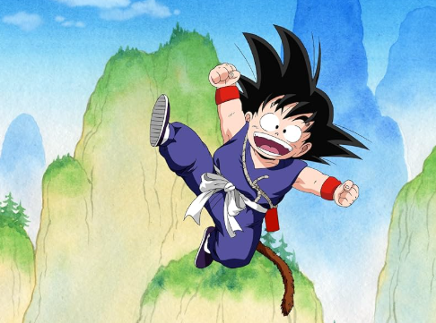 This image is a picture of child Goku balancing on top of a mountain peak. 